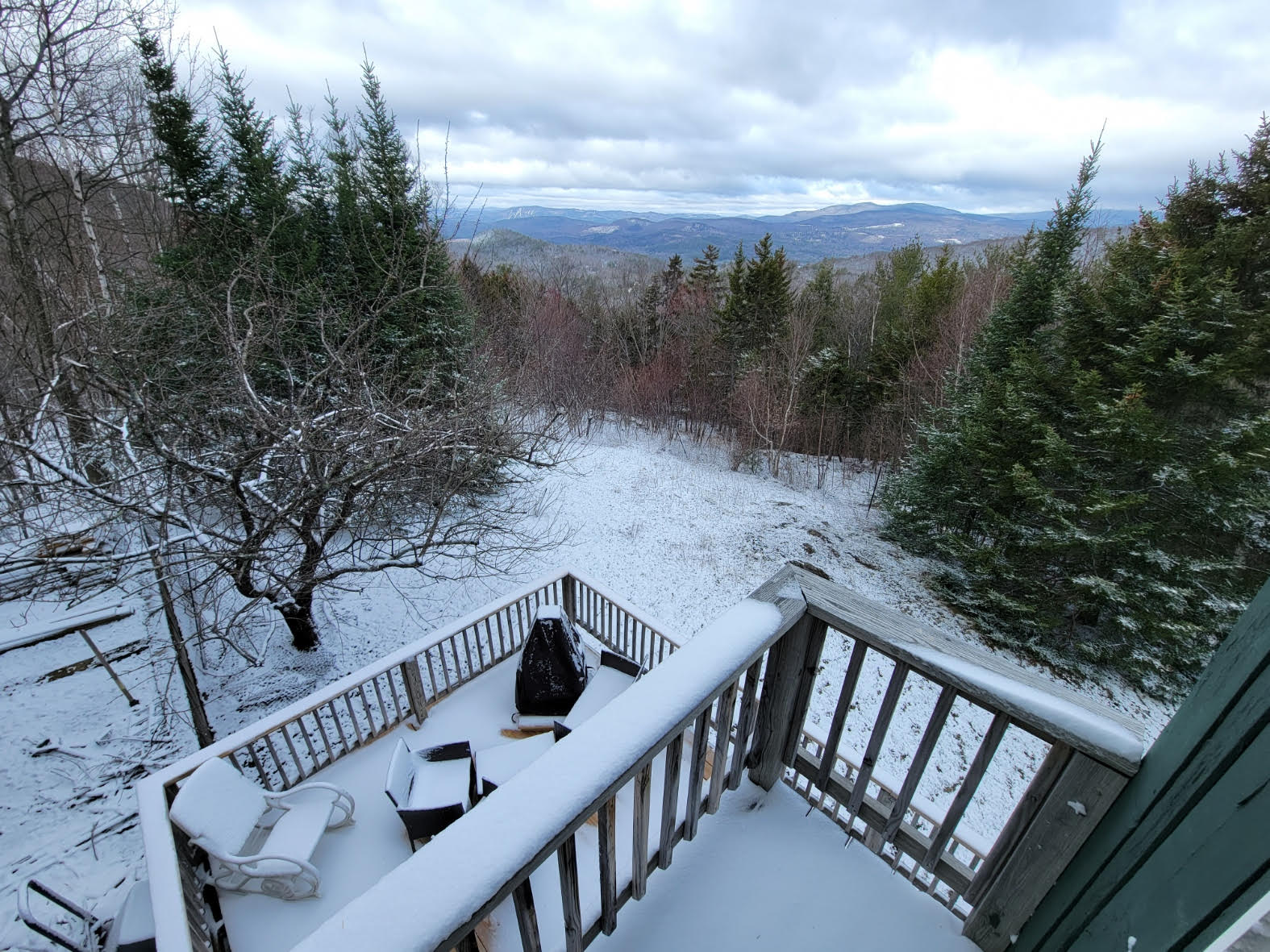snowy deck and yard